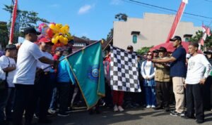 Polsek Cimaragas Polres Ciamis Monitoring Jalan Santai Peringatan HUT ke-79 RI di Desa Beber