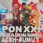 ATLET JIU JITSU SUMATERA UTARA YANG MERUPAKAN PRAJURIT YONIF 8 MARINIR RAIH MEDALI PERAK DI AJANG PON XXI ACEH-SUMUT