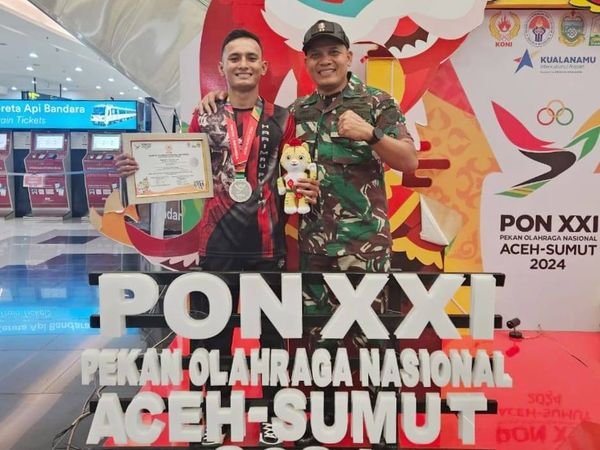 ATLET JIU JITSU SUMATERA UTARA YANG MERUPAKAN PRAJURIT YONIF 8 MARINIR RAIH MEDALI PERAK DI AJANG PON XXI ACEH-SUMUT