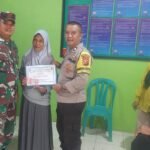 Polsek Cipaku Polres Ciamis Terjunkan Personel Amankan Penyaluran BLT DD di Desa Jalatrang