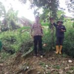 Polsek Cisaga Polres Ciamis Proses Pengukuran Tanah Program PTSL di Desa Tanjungjaya