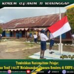 Tumbuhkan Nasionalisme Pelajar  Satgas Yonif 144/JY Melaksanakan Upacara Bendera di SMPN Asikie