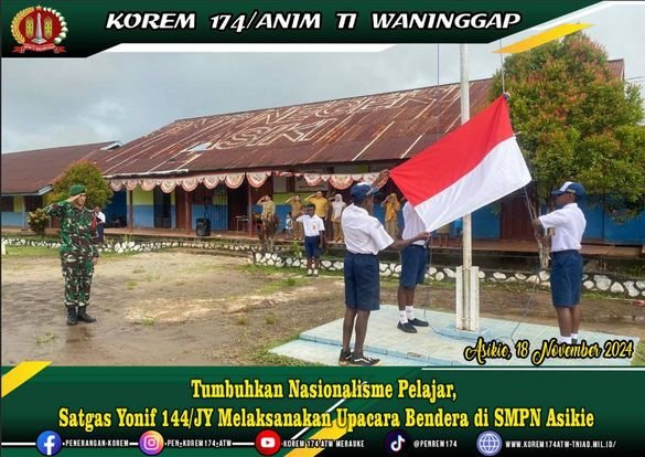 Tumbuhkan Nasionalisme Pelajar  Satgas Yonif 144/JY Melaksanakan Upacara Bendera di SMPN Asikie