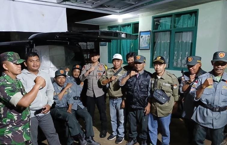 Polsek Kawali Polres Ciamis Kawal Penarikan Logistik ke Tingkat PPS Pasca Pencoblosan